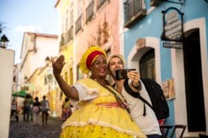 A tourist takes photo with a cubanian woman